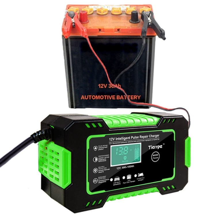 Battery smart charger connected to a 12V automotive battery, LCD screen visible.