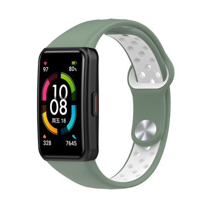 Two-color silicone watch band with reverse buckle, green strap with light gray perforated underside