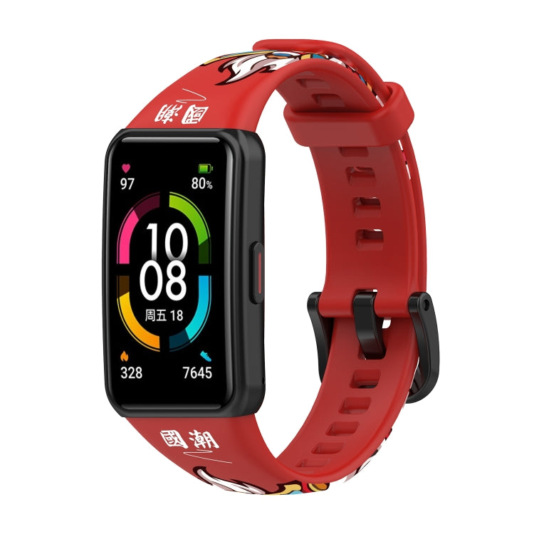 Red silicone watch band with lion graphic and adjustment holes
