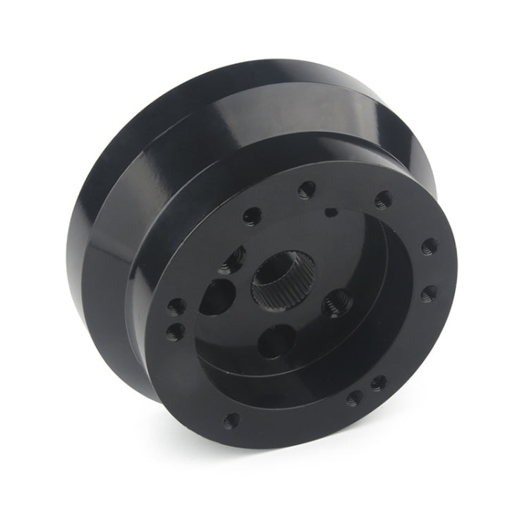 Black steering wheel hub adapter with multiple bolt holes and center splined opening