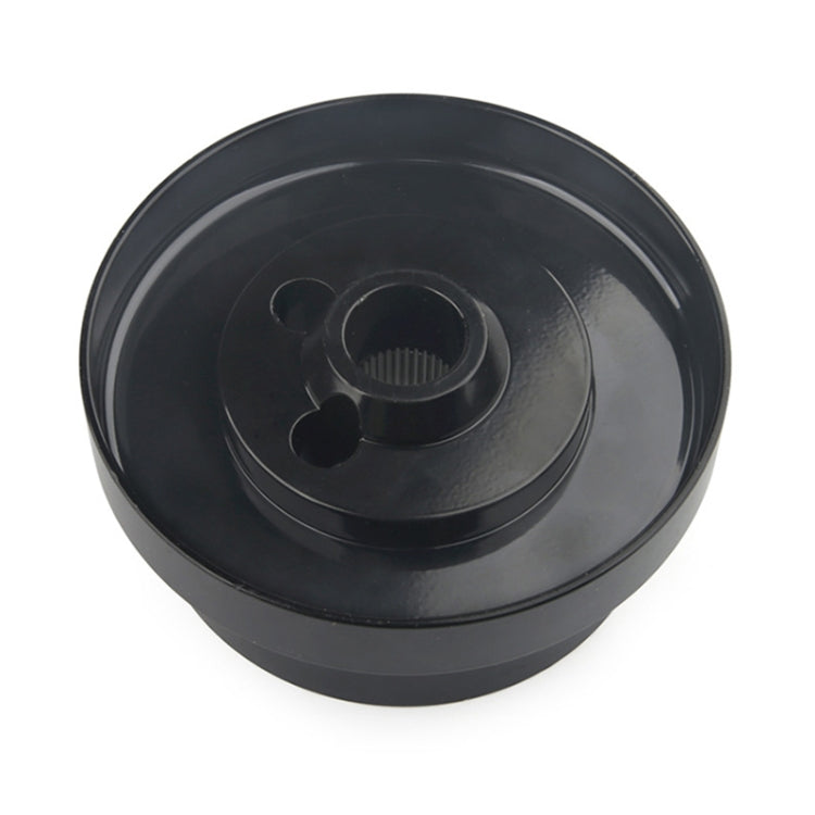 Black steering wheel hub adapter with round outer body and center splined hub