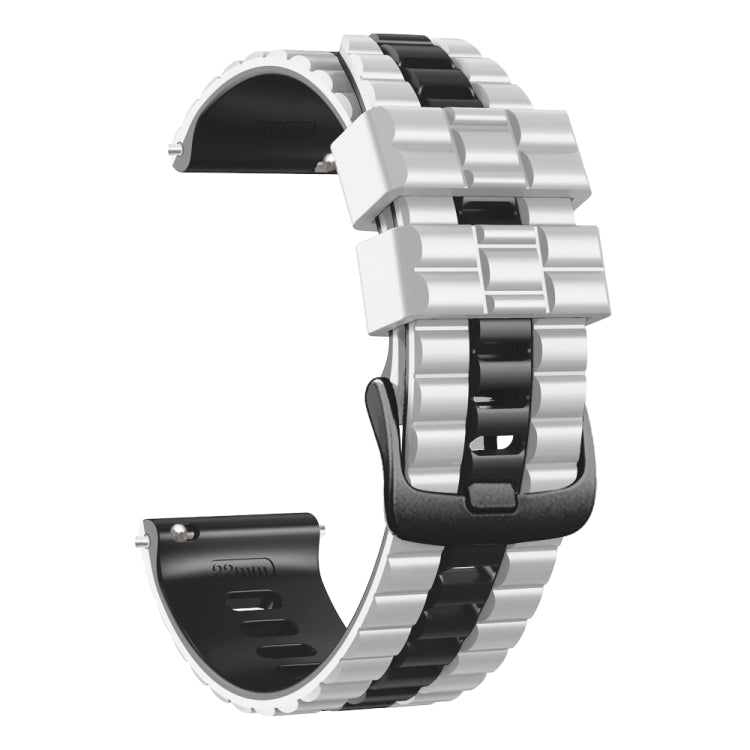 Two-tone silicone watch band showing clasp and strap end, black and silver tones