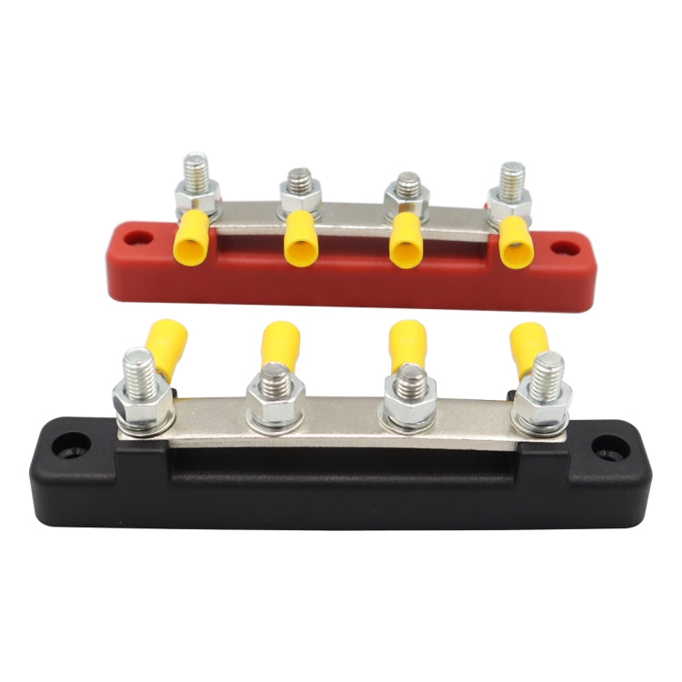 DC busbar terminal blocks with red base, black housing, and multiple silver stud bolts with yellow tips