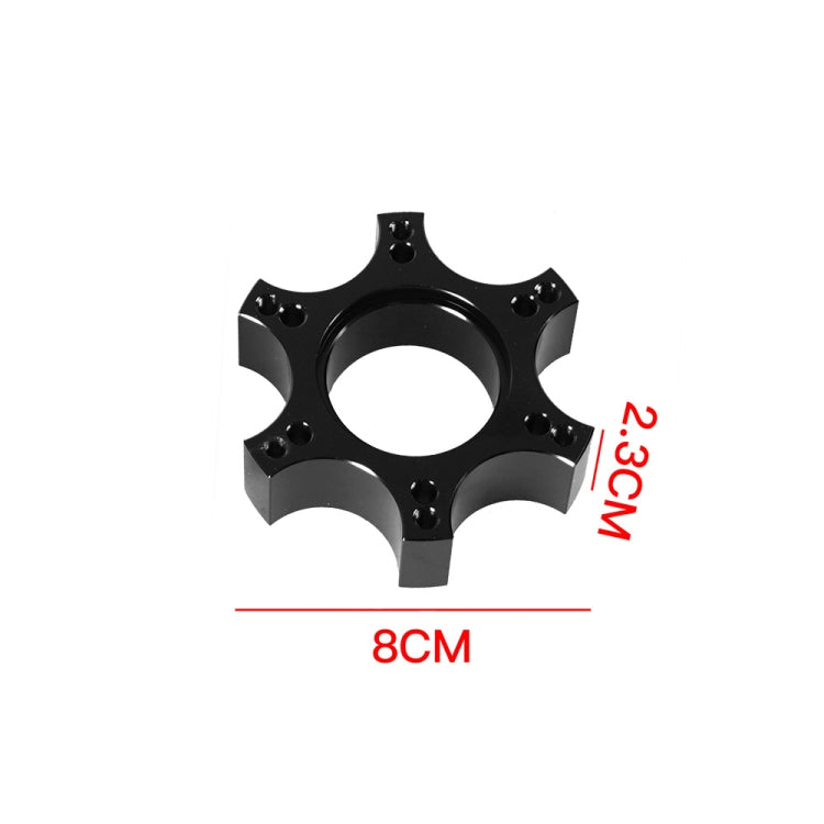 Black wheel hub adapter with center opening, 8 cm diameter and 2.3 cm height