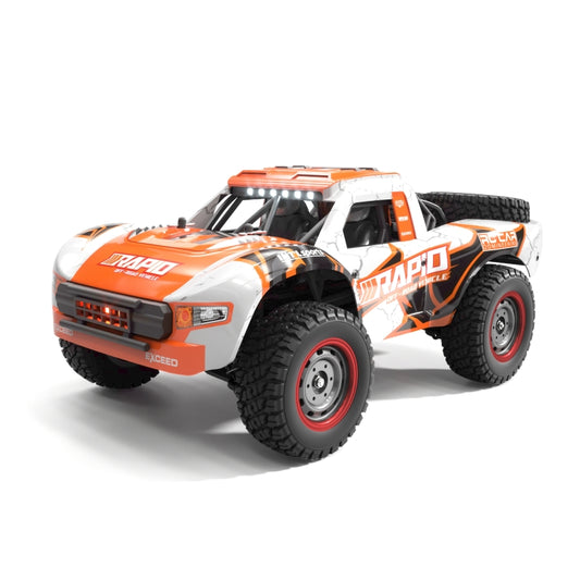 Brushless RC pickup truck with orange-and-white body, LED light bar, and off-road tires
