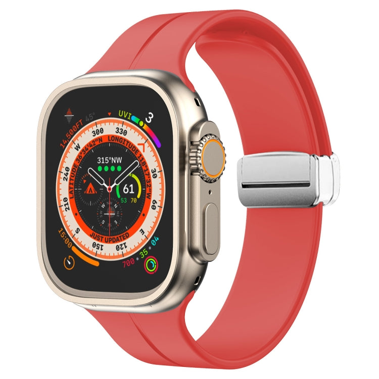 Red silicone magnetic fold clasp watch band with metal connector and end lugs