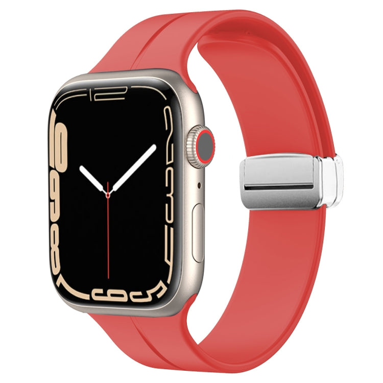 Red silicone magnetic fold clasp watch band with silver clasp hardware and loop