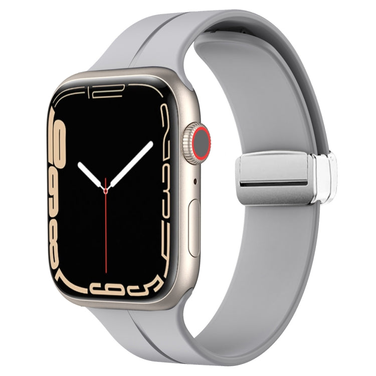 Gray silicone watch band with magnetic fold clasp for Apple Watch, front view.