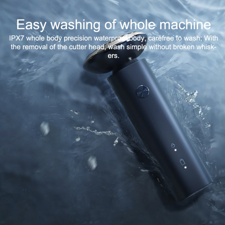 Blue electric shaver with water droplets, waterproof body