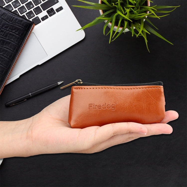 Firedog brown zippered tobacco pouch held in hand