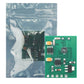 Green PCB component board with protective plastic bag and circuit parts