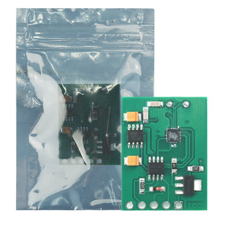 Green PCB component board with protective plastic bag and circuit parts