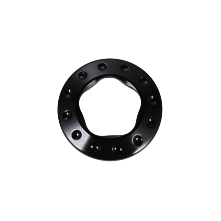 Black metal cap ring with circular slots and included removal tool