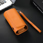 Orange portable electronic cigarette case with wrist strap and stitched front panel