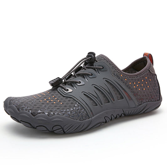 Gray lace-up outdoor hiking shoes with perforated upper detail and cushioned sole