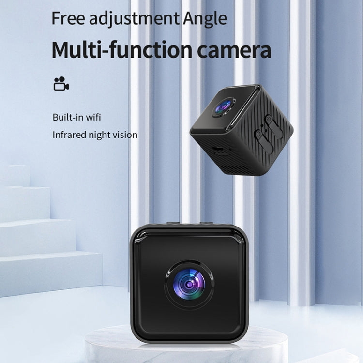 Black mini WiFi security camera with visible front lens on a tabletop display