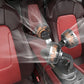 Three-head car fan with orange grilles mounted near rear car seats