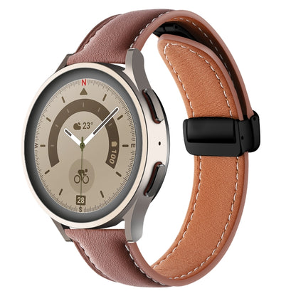 Brown genuine leather watch band with folding buckle and visible stitching, black clasp.