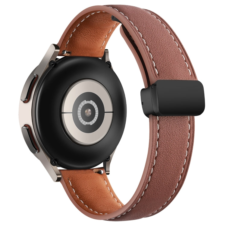 Brown genuine leather watch band with folding buckle, black strap buckle and stitched edges.