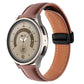 Brown genuine leather watch band with folding buckle, black strap buckle, side view.