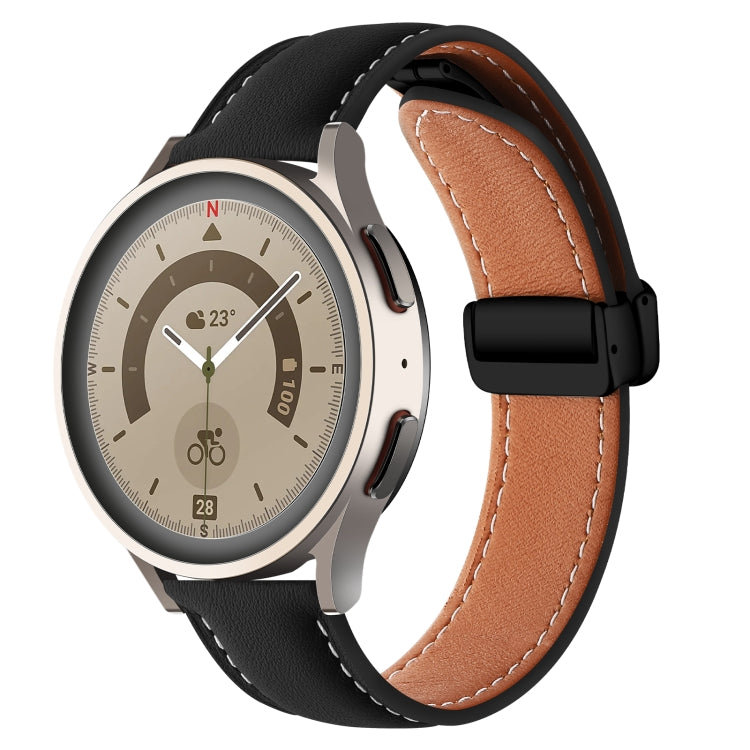 Black genuine leather watch band with folding buckle, brown underside and stitched trim.