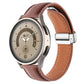 Brown genuine leather watch band with folding buckle and silver hardware, close side view.