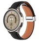 Black genuine leather watch band with folding buckle, black hardware and brown contrast stitching.