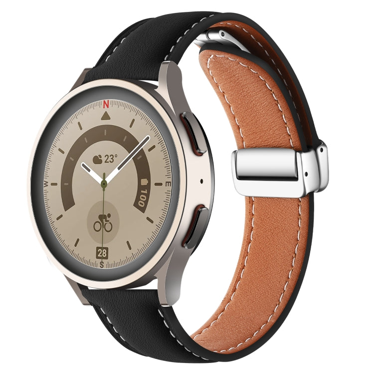 Black genuine leather watch band with folding buckle, black hardware and brown contrast stitching.