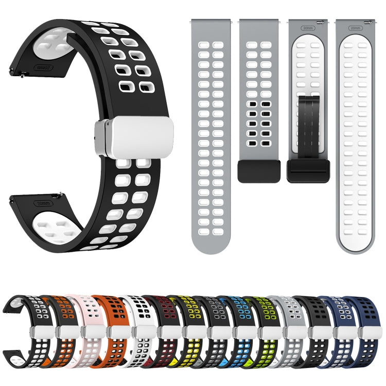 Perforated silicone watch band with fold buckle; black strap with white inner band.