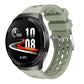 Silicone watch band with perforated holes, light green color and metal buckle