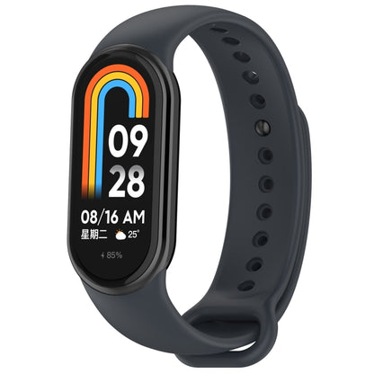 Smartwatch strap with rainbow-style screen on dark gray silicone band