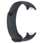 Gray silicone smartwatch strap underside showing two charging plug openings