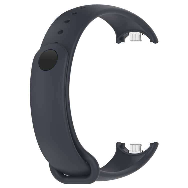 Gray silicone smartwatch strap underside showing two charging plug openings