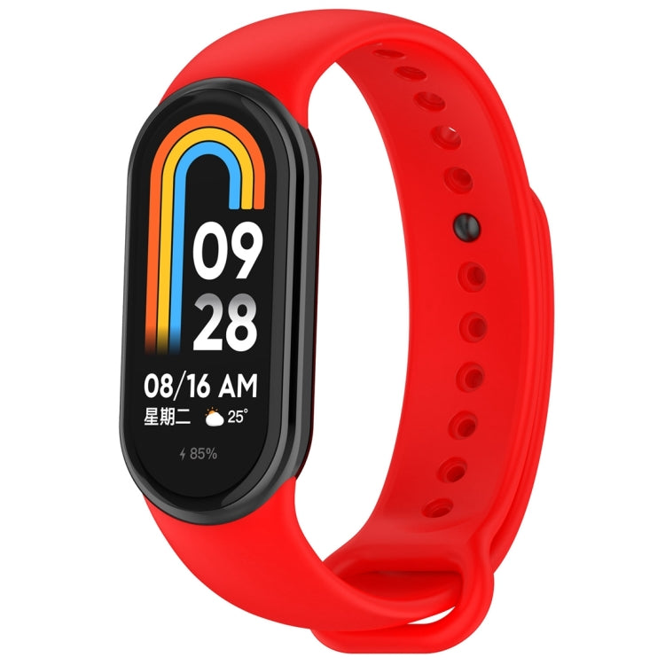 Red silicone smartwatch band with oval tracker body, perforated holes