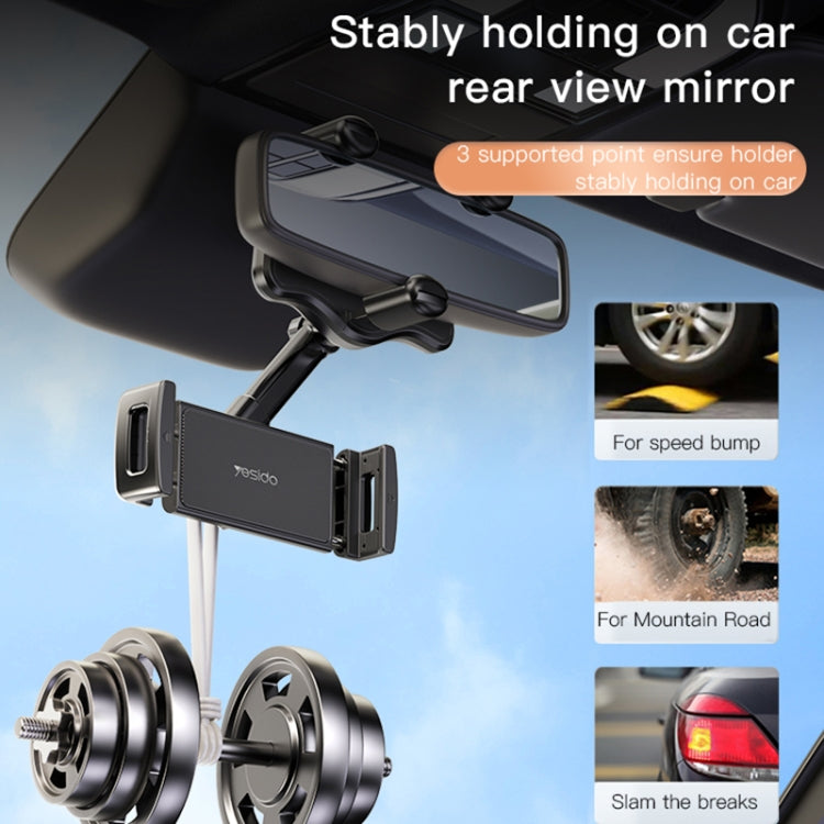 Car rearview mirror phone holder with secure clamp arms and phone cradle