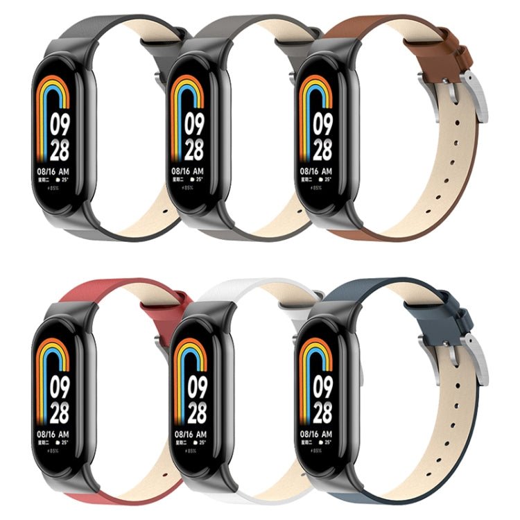 Leather watch band set in black, grey, brown, and blue with metal buckle loops.
