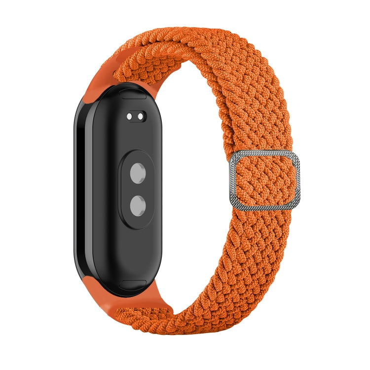 Adjustable braided elastic watch band in orange with adjustable metal clasp