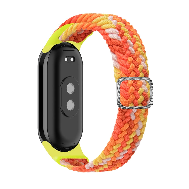 Adjustable braided elastic watch band with bright rainbow stripes and adjustable metal clasp