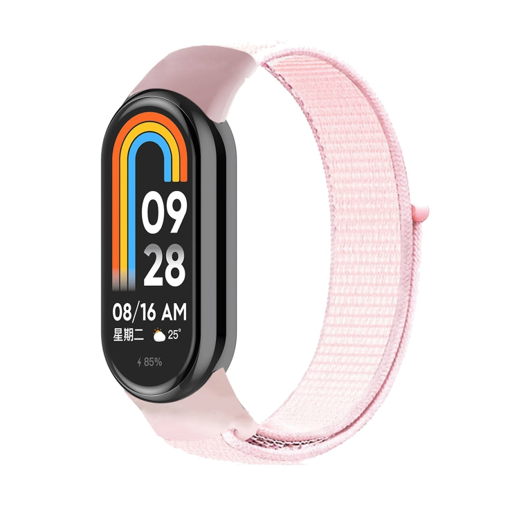 Loop nylon watch band with pink strap and black smartwatch display