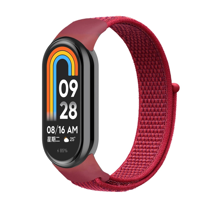 Loop nylon watch band with red strap and black smartwatch display