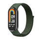 Olive green nylon loop watch band with small clasp, attached to a smartwatch.