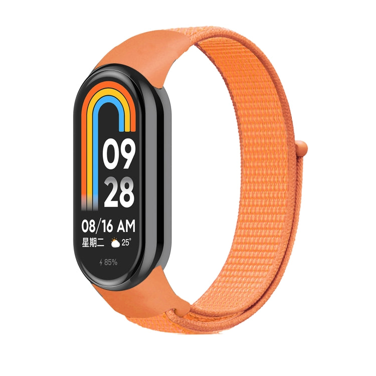 Orange nylon loop watch band with small clasp, attached to a smartwatch frame.