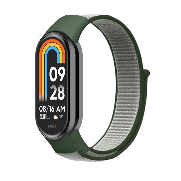 Light gray and olive green nylon loop watch band with small clasp, on smartwatch.