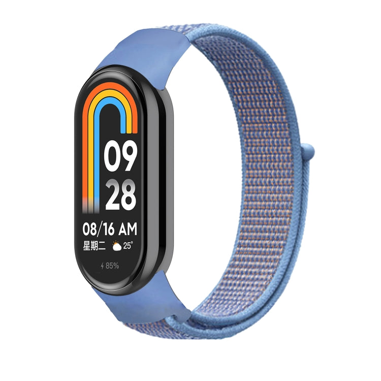 Loop nylon watch band with blue strap and black smartwatch display