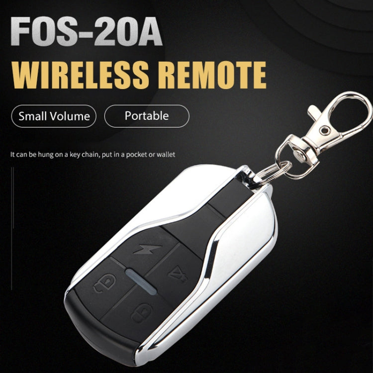 Wireless key remote fob with key ring, black and silver body, front view