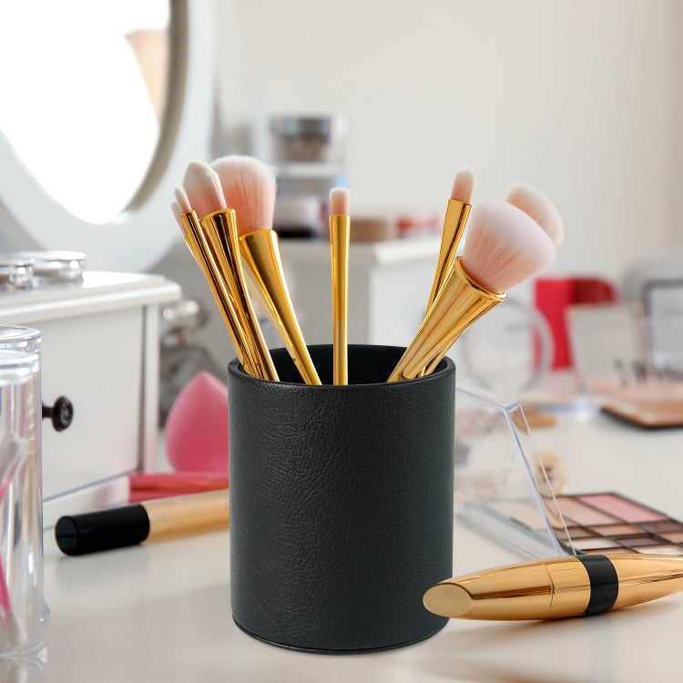 Black PU leather pen holder cup with colorful pens on a vanity desk