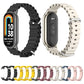 Breathable silicone watch bands in black and light beige, shown front and back