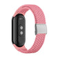 Pink braided nylon watch band with adjustable steel buckle and silver clasp