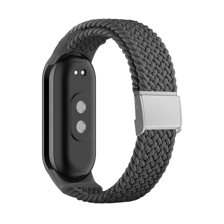 Grey braided nylon watch band with adjustable steel buckle and silver clasp