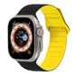 Two-tone silicone watch band, black and yellow loop magnetic style for Apple Watch.